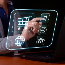 Man making a purchase of products in a virtual store from his laptop. Stores and virtual commerce.